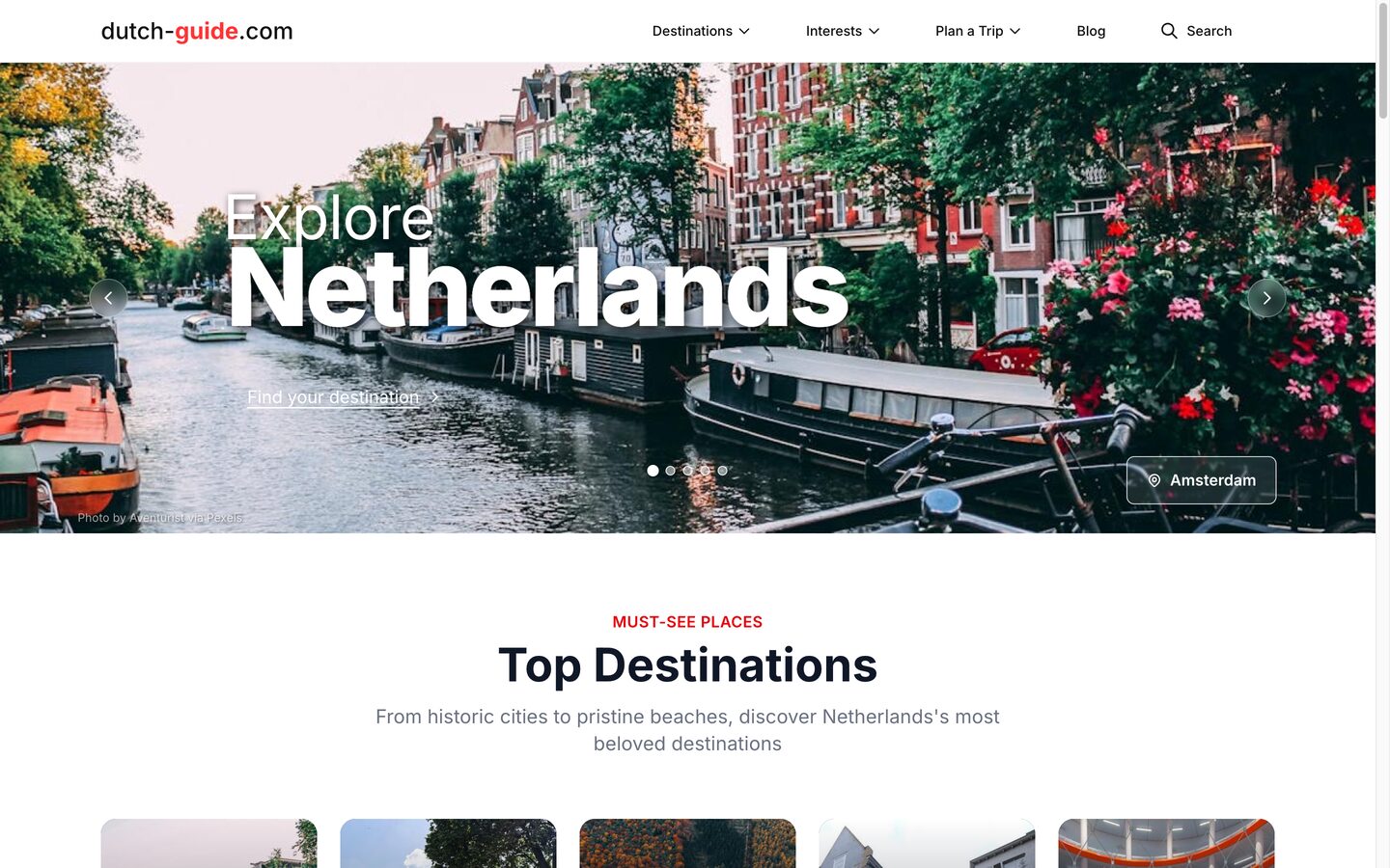 dutch-guide.com - the platform rebranded for the Netherlands, hero over an Amsterdam canal